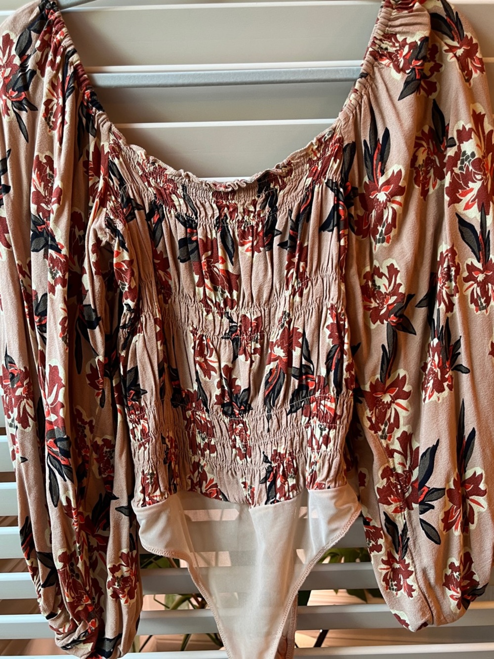 Free People Floral Smocked Long-Sleeve Bodysuit in Beige and Rust